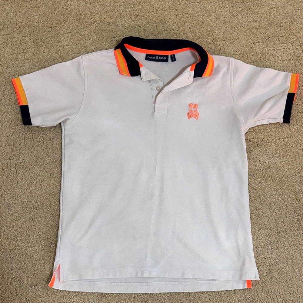 Psycho Bunny Kids Polo in White with Orange and Black Trim